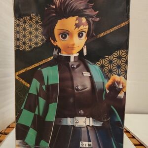 Anime Character Figure with Green and Black Outfit